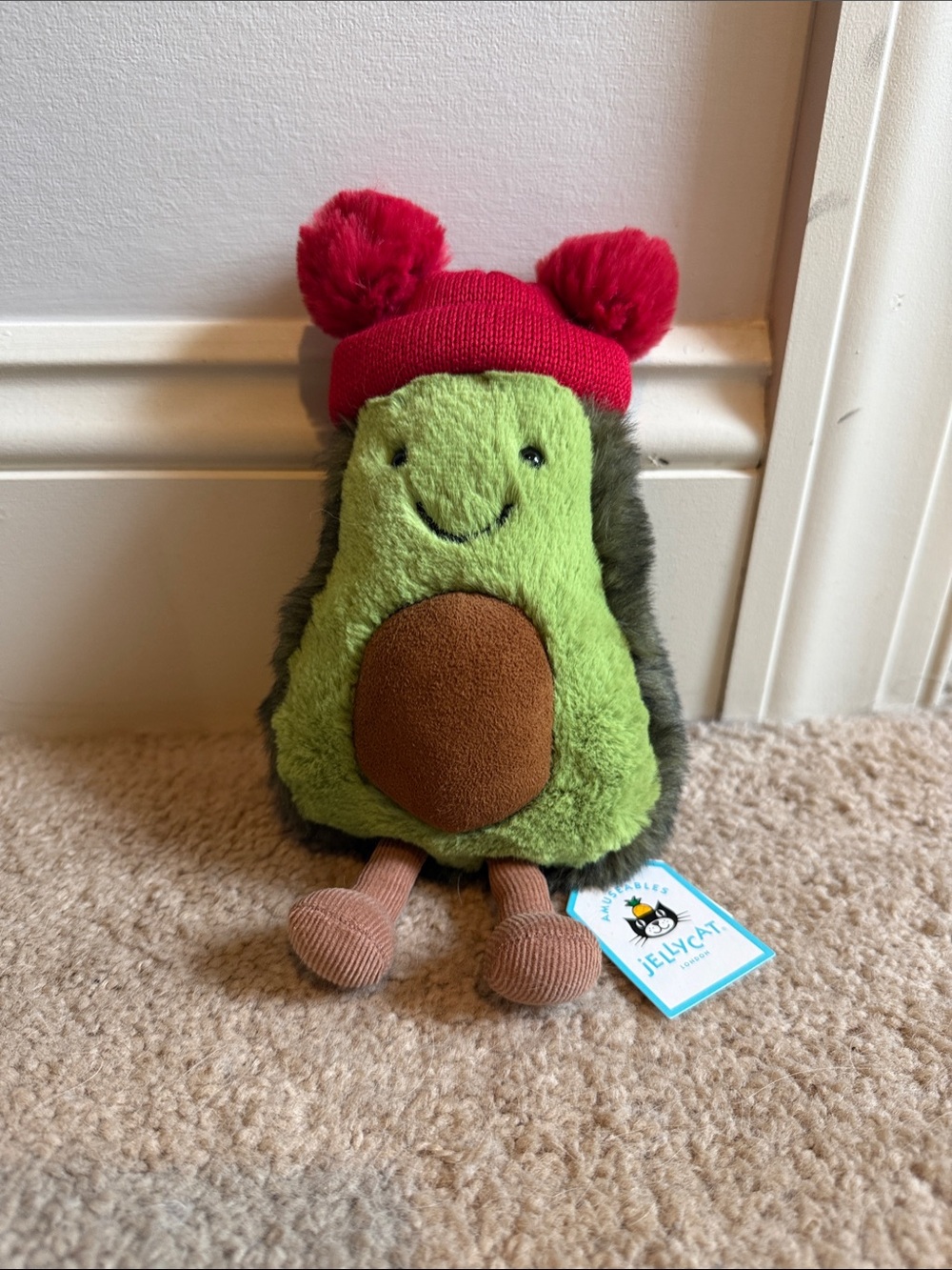 Jellycat Plush Avocado Toy in Green with Red Hat and Brown Seed